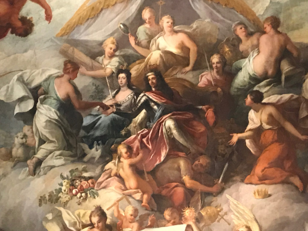 William and Mary, with 'Tyranny' (basically, Louis XIV of France) crushed under the stocking leg of William. Note the papal crown and the sun (Louis was the Sun King) falling to the ground.